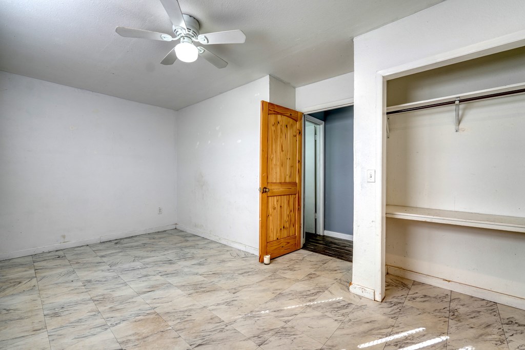 131 Hickory Ridge Circle Hayesville, NC 28904 - Photo 28 of 35 a view of an empty room with a ceiling fan