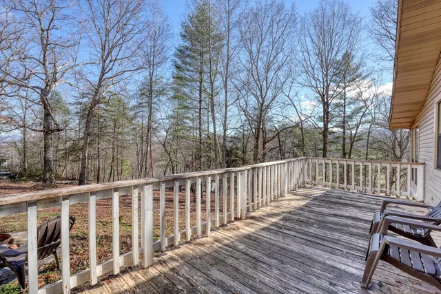 a view of a wooden roof deck