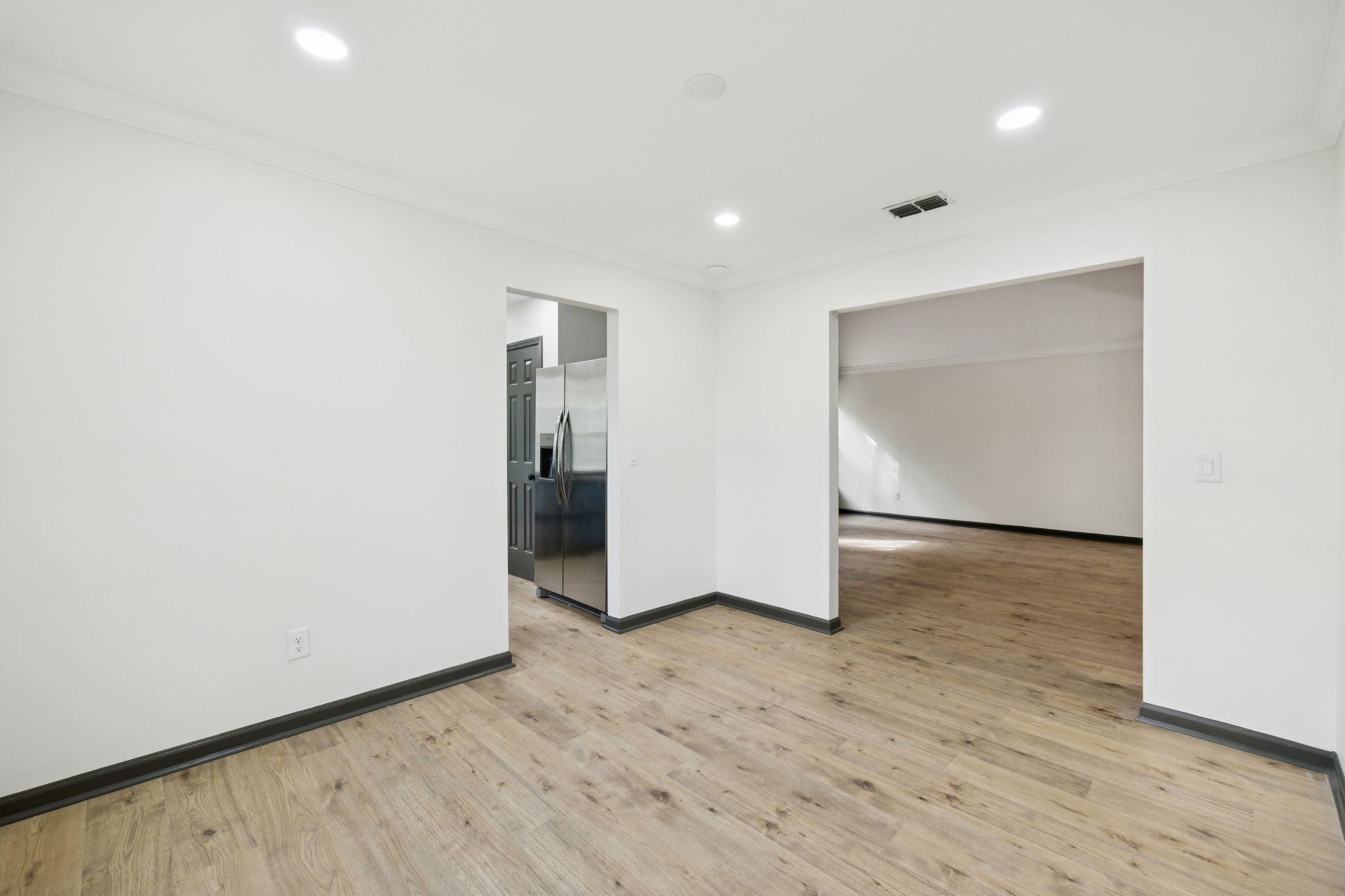 4612 Raccoon Trail Hermitage, TN 37076 - Photo 12 of 36 a view of empty room with wooden floor