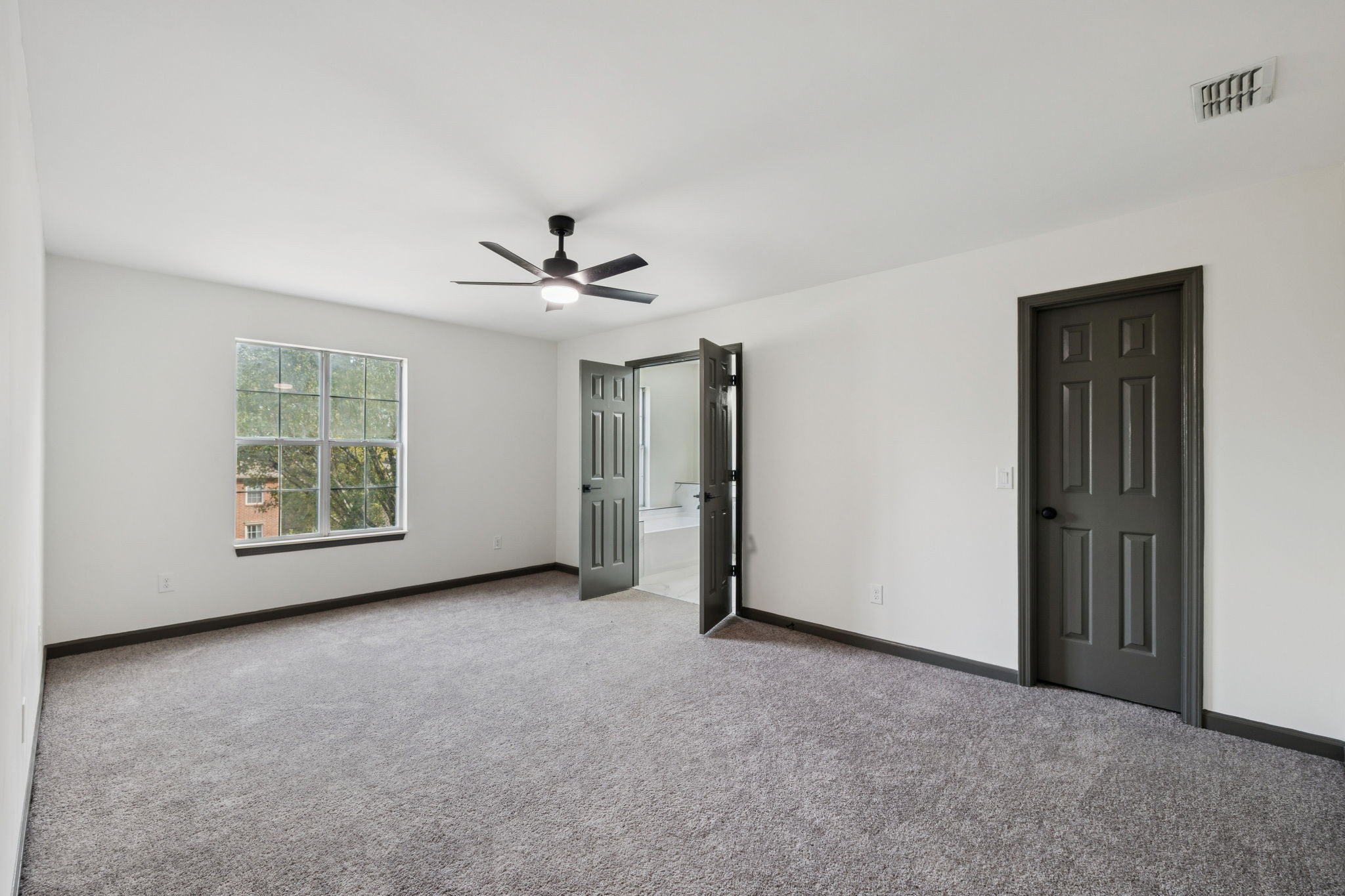 4612 Raccoon Trail Hermitage, TN 37076 - Photo 18 of 36 a view of an empty room with a window