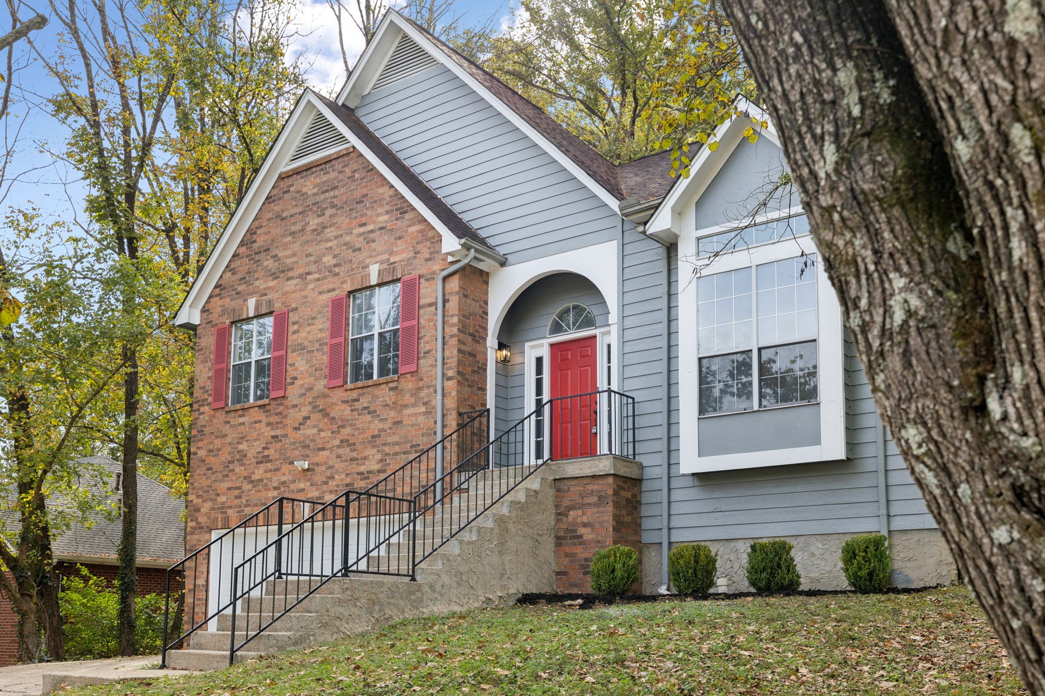 4612 Raccoon Trail Hermitage, TN 37076 - Photo 2 of 36 a front view of a house with garage