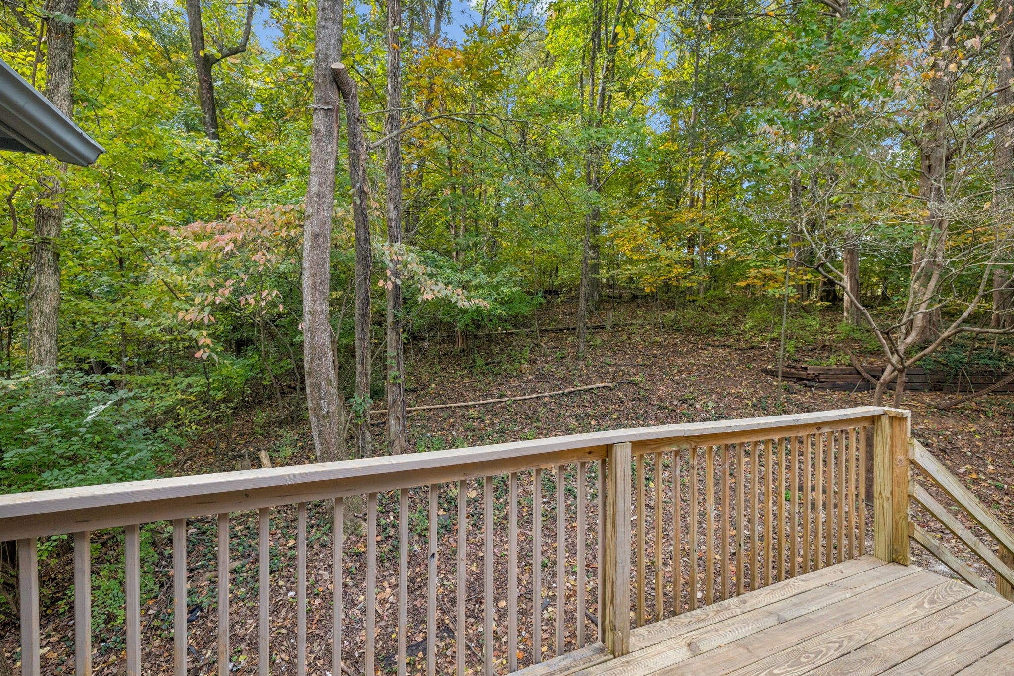 4612 Raccoon Trail Hermitage, TN 37076 - Photo 32 of 36 a view of a wooden deck