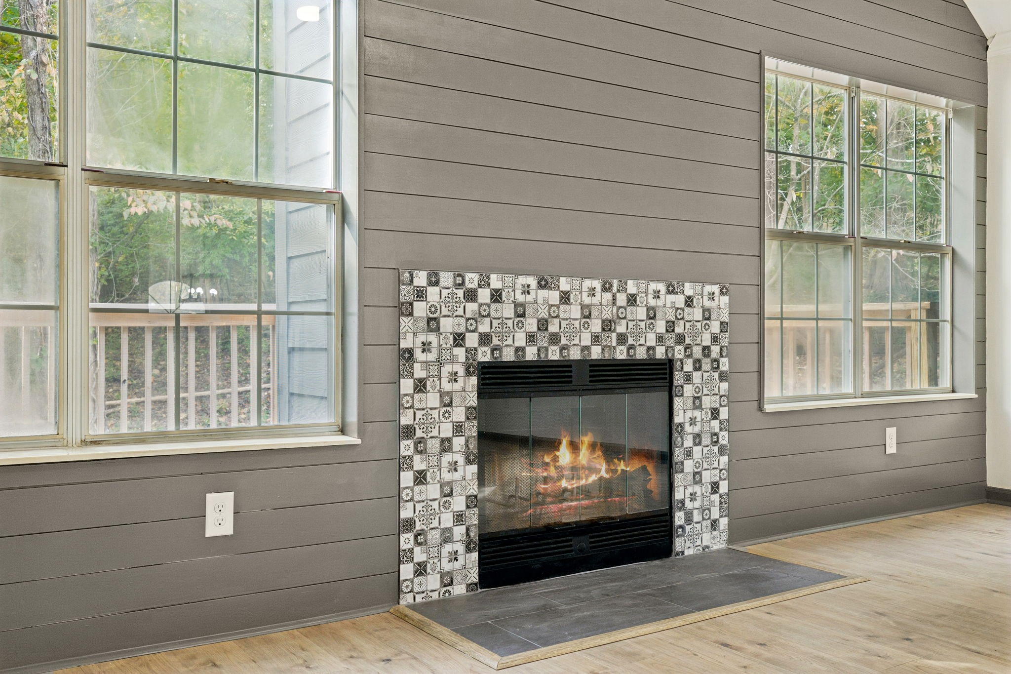 4612 Raccoon Trail Hermitage, TN 37076 - Photo 9 of 36 a living room with a fireplace with windows