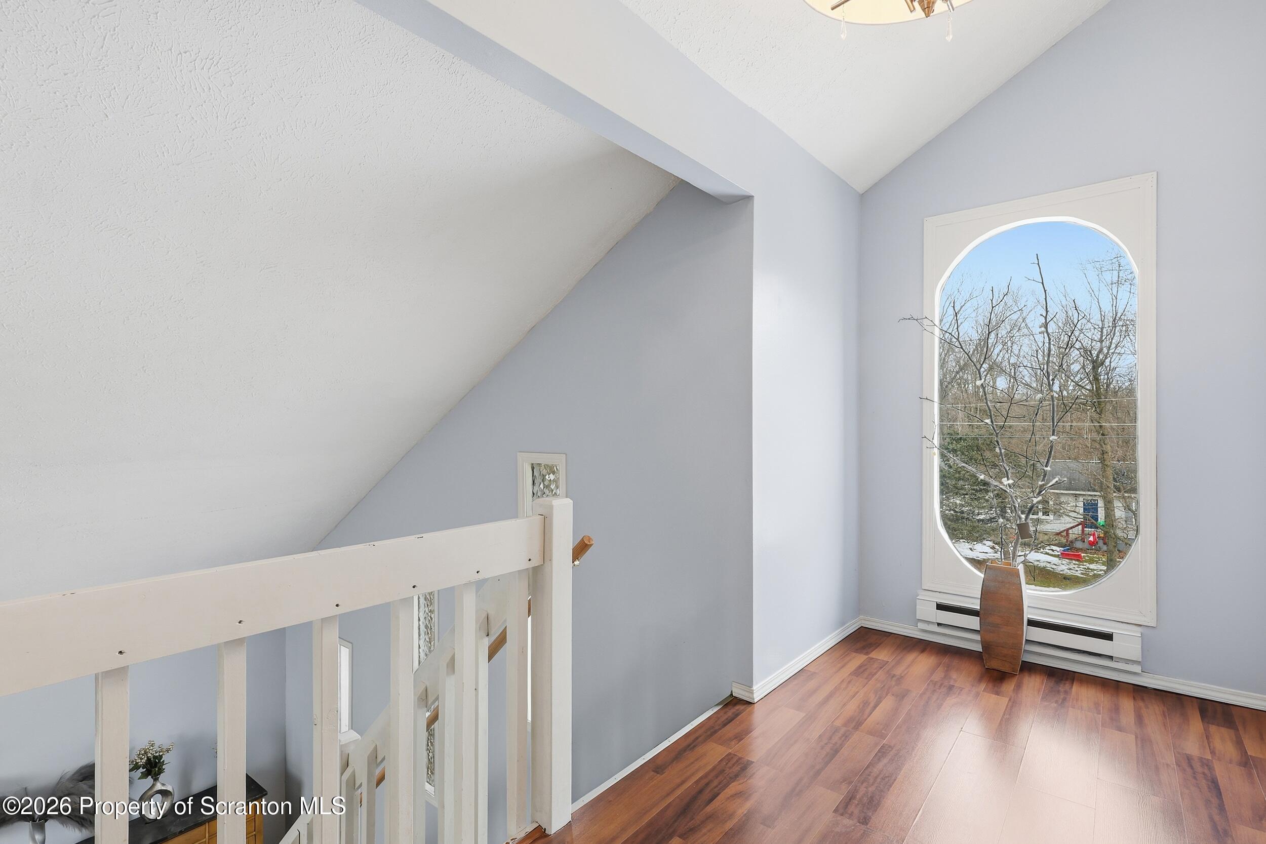 1379 Winding Way Tobyhanna, PA 18466 - Photo 17 of 51 a view of room with window and wooden floor