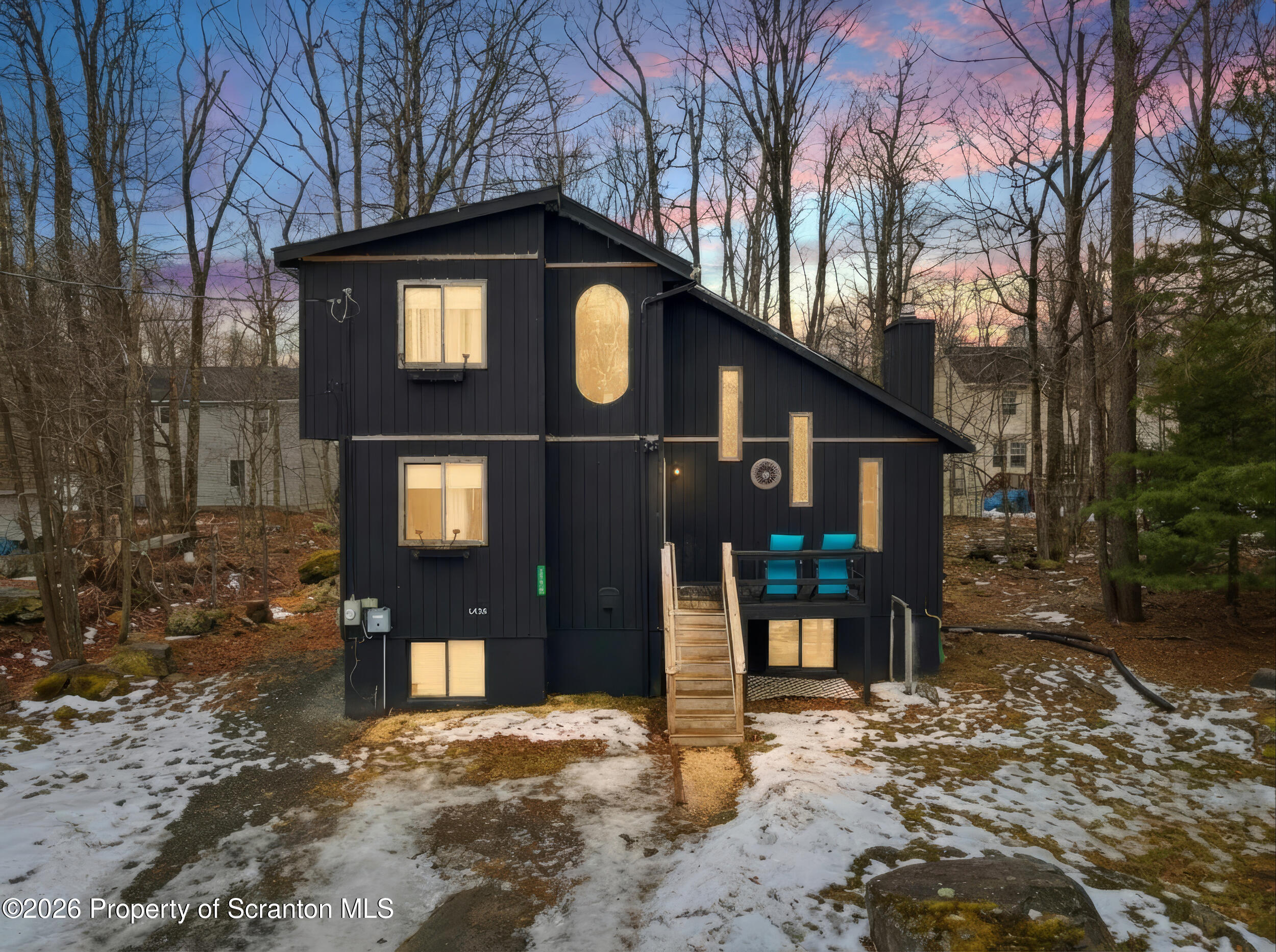 1379 Winding Way Tobyhanna, PA 18466 - Photo 2 of 51 a front view of a house with a yard