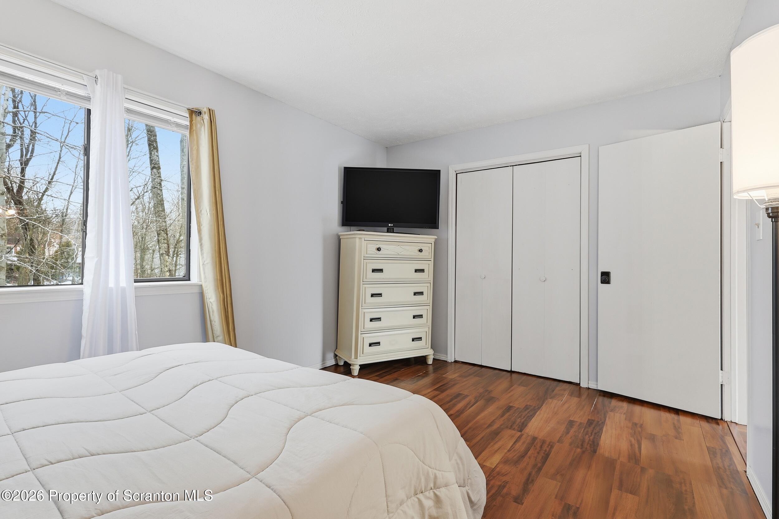 1379 Winding Way Tobyhanna, PA 18466 - Photo 25 of 51 a view of a bedroom with window and cabinet