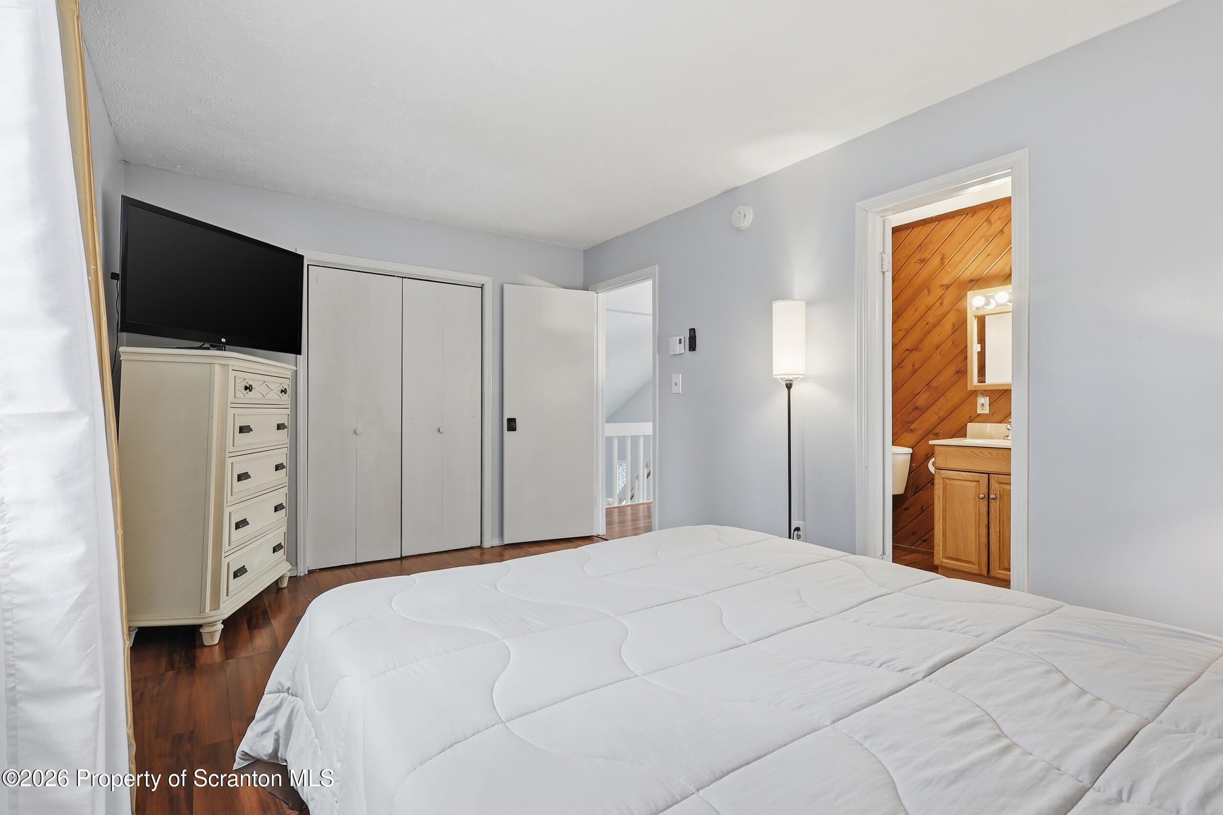 1379 Winding Way Tobyhanna, PA 18466 - Photo 27 of 51 a bedroom with a bed and a television