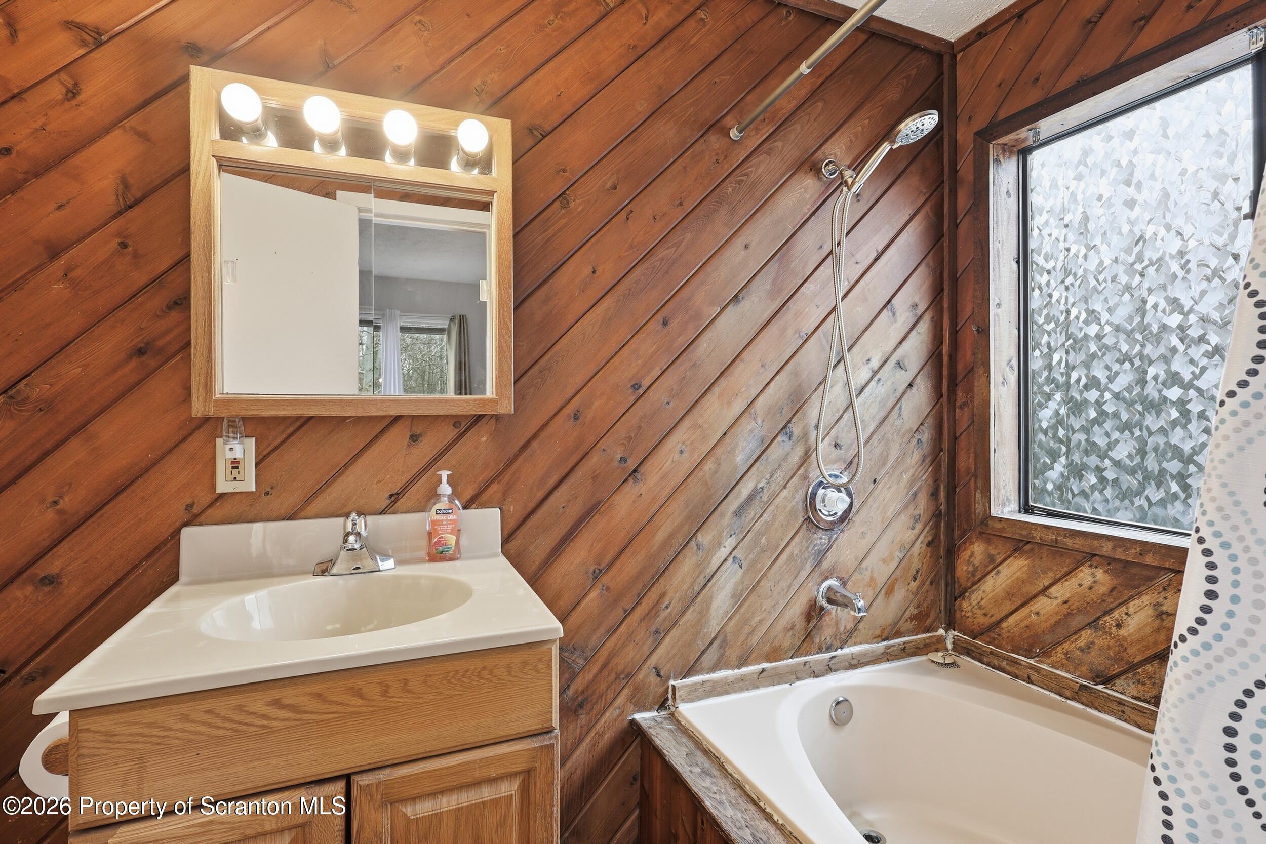 1379 Winding Way Tobyhanna, PA 18466 - Photo 29 of 51 a bathroom with a sink and a bathtub