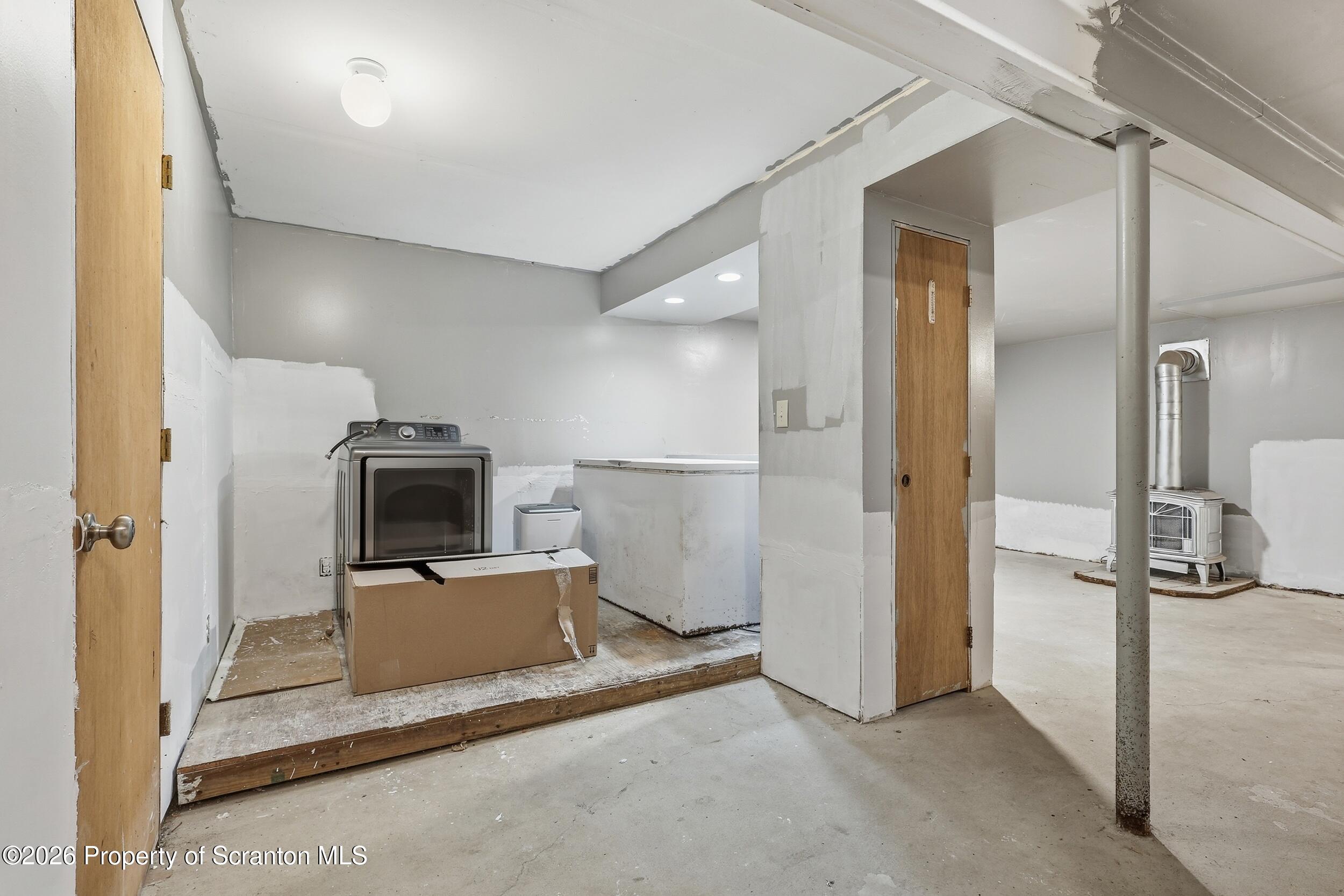 1379 Winding Way Tobyhanna, PA 18466 - Photo 32 of 51 a view of a kitchen with a sink and a refrigerator