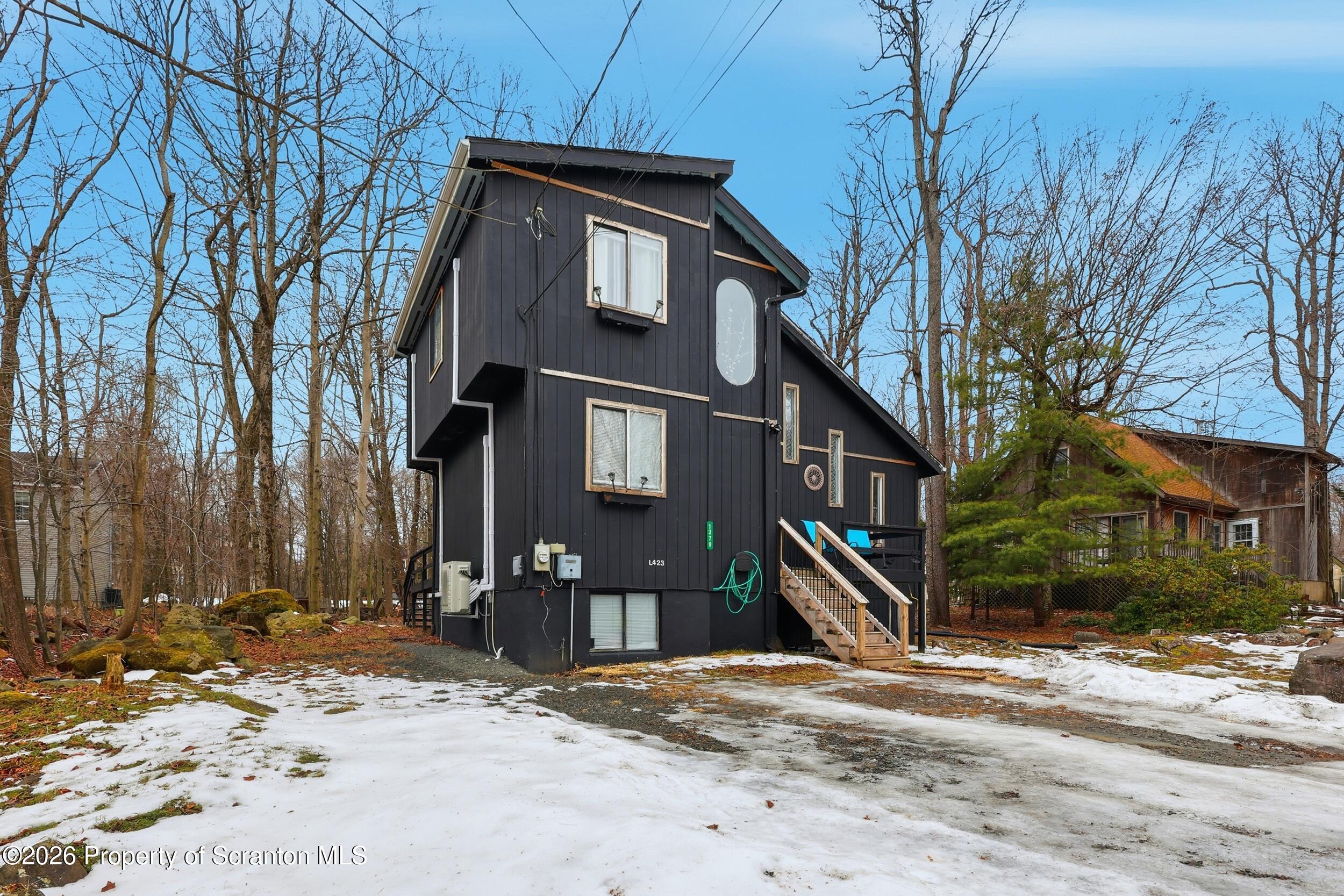 1379 Winding Way Tobyhanna, PA 18466 - Photo 46 of 51 a front view of a house with a yard