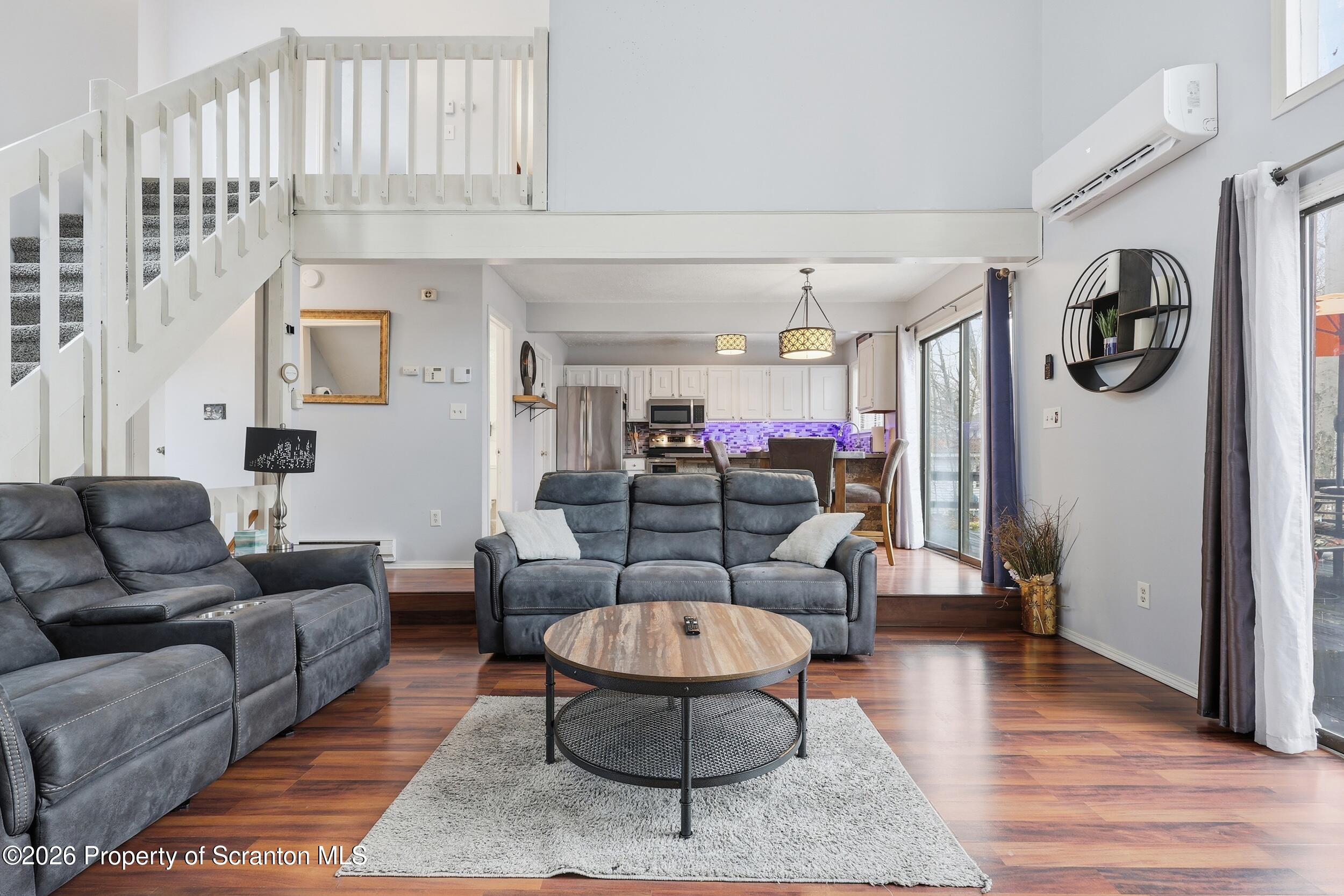 1379 Winding Way Tobyhanna, PA 18466 - Photo 10 of 51 a living room with furniture and a wooden floor