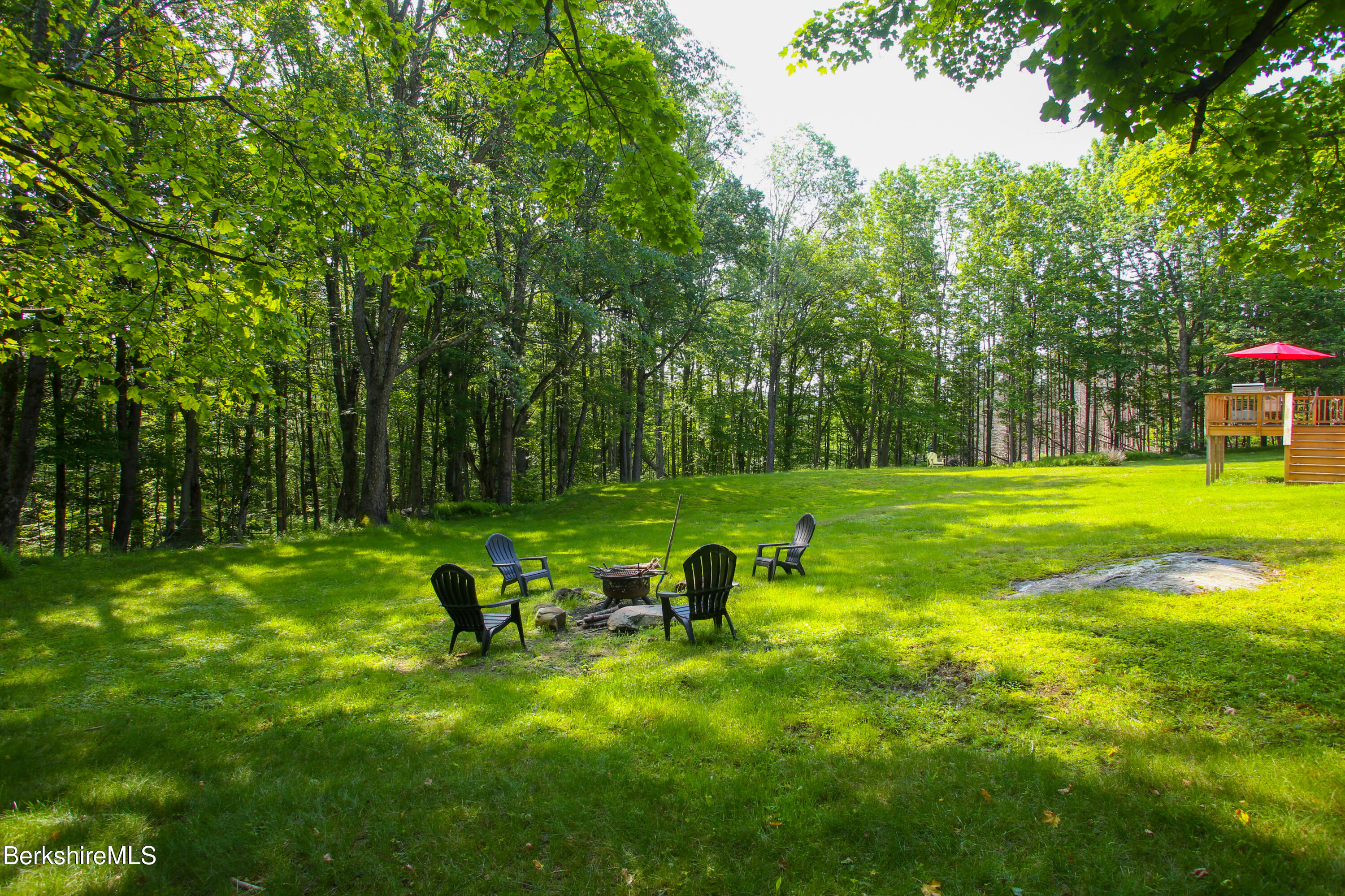 127 County Road Rowe, MA 01367 - Photo 26 of 29 a view of a golf course with a garden