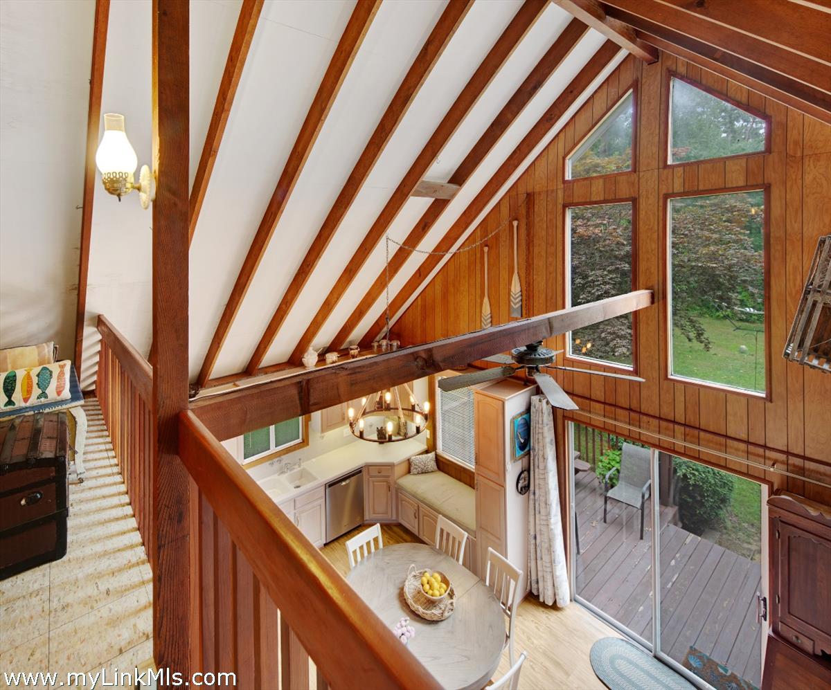 9 Galway Road West Tisbury, MA 02568 - Photo 22 of 26 a view of a balcony with wooden floor and furniture