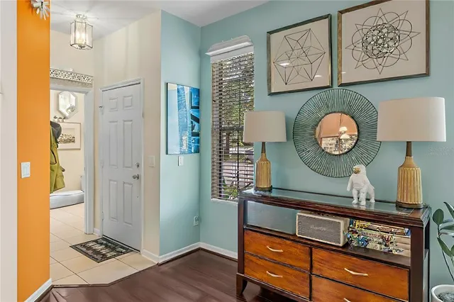 a view of a chairs and table in the patio