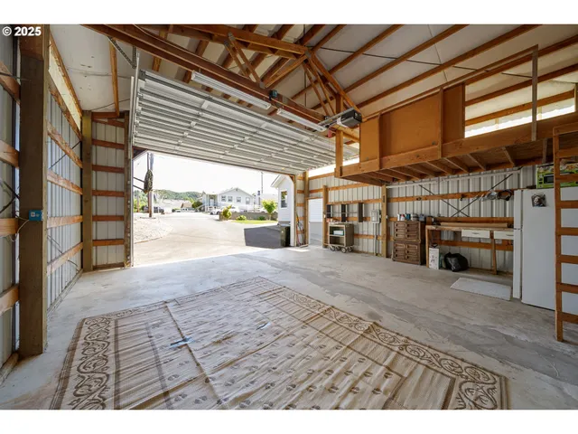 a aerial view of a house with a yard