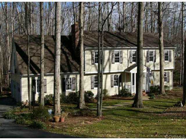1219 Kingscross Road Midlothian, VA 23114 - Photo 1 of 1 front view of house with a yard