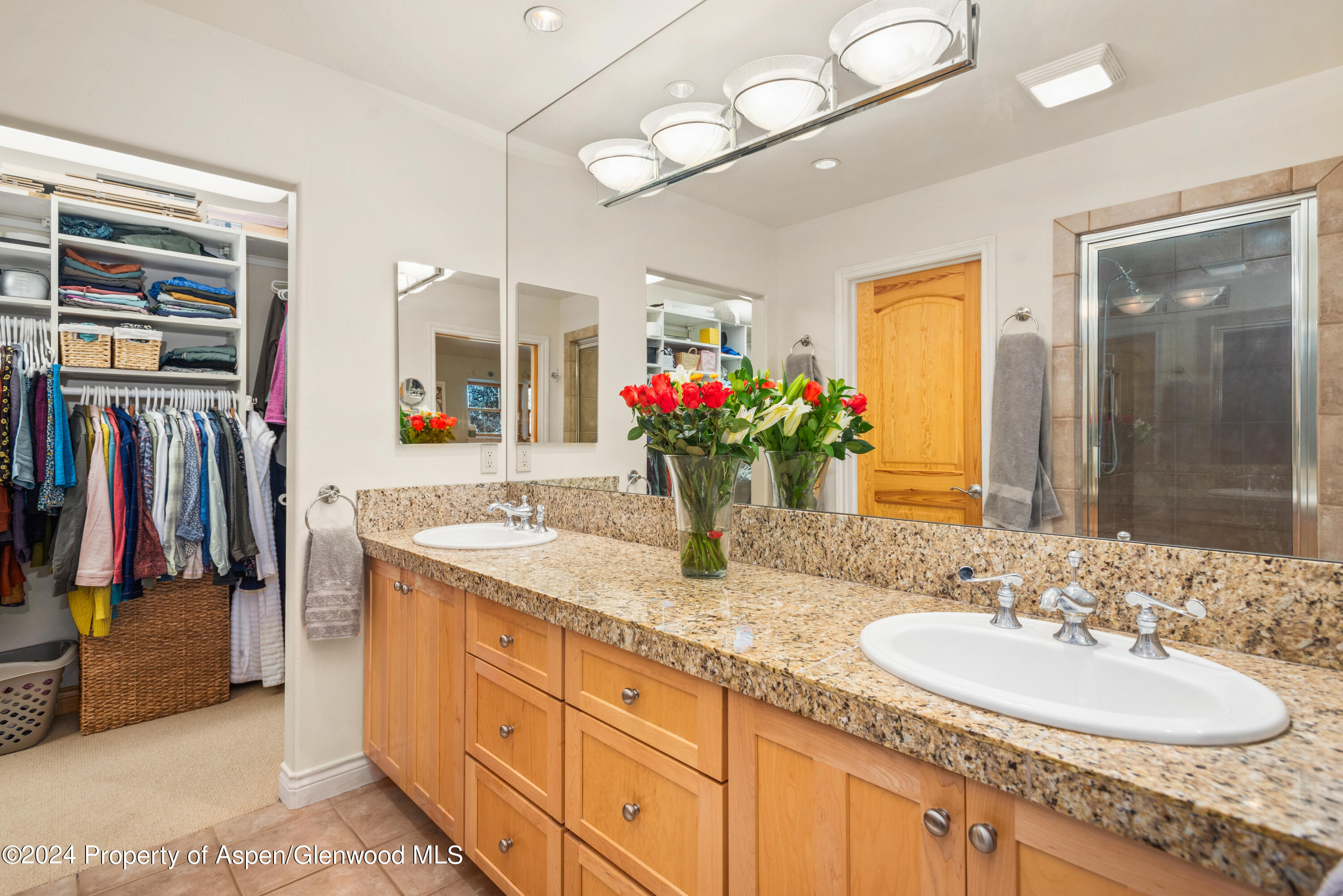 325 Summerset Lane, Unit A Basalt, CO 81621 - Photo 10 of 22 a bathroom with a double vanity sink and a mirror