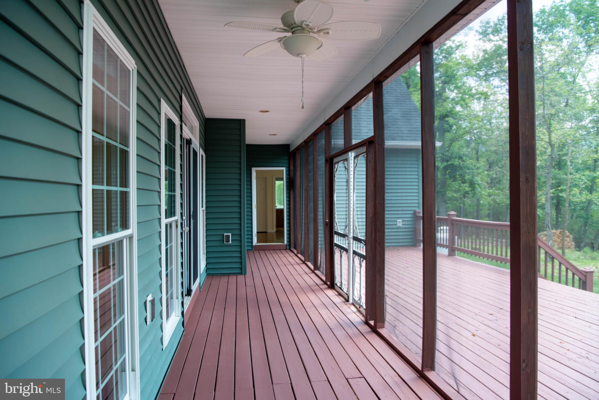 792 Forest Glen Road Moorefield, WV 26836 - Photo 79 of 146 Serene screened porch retreat.