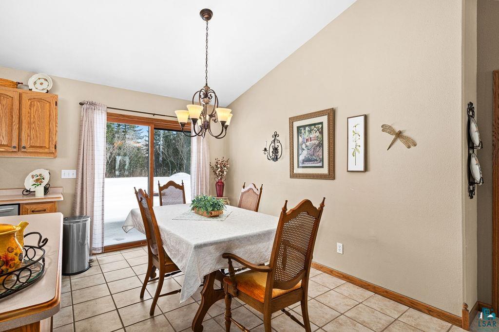 6139 North Sunset Ridge Road Duluth, MN 55803 - Photo 12 of 23 Dining area with outdoor access to the patio.