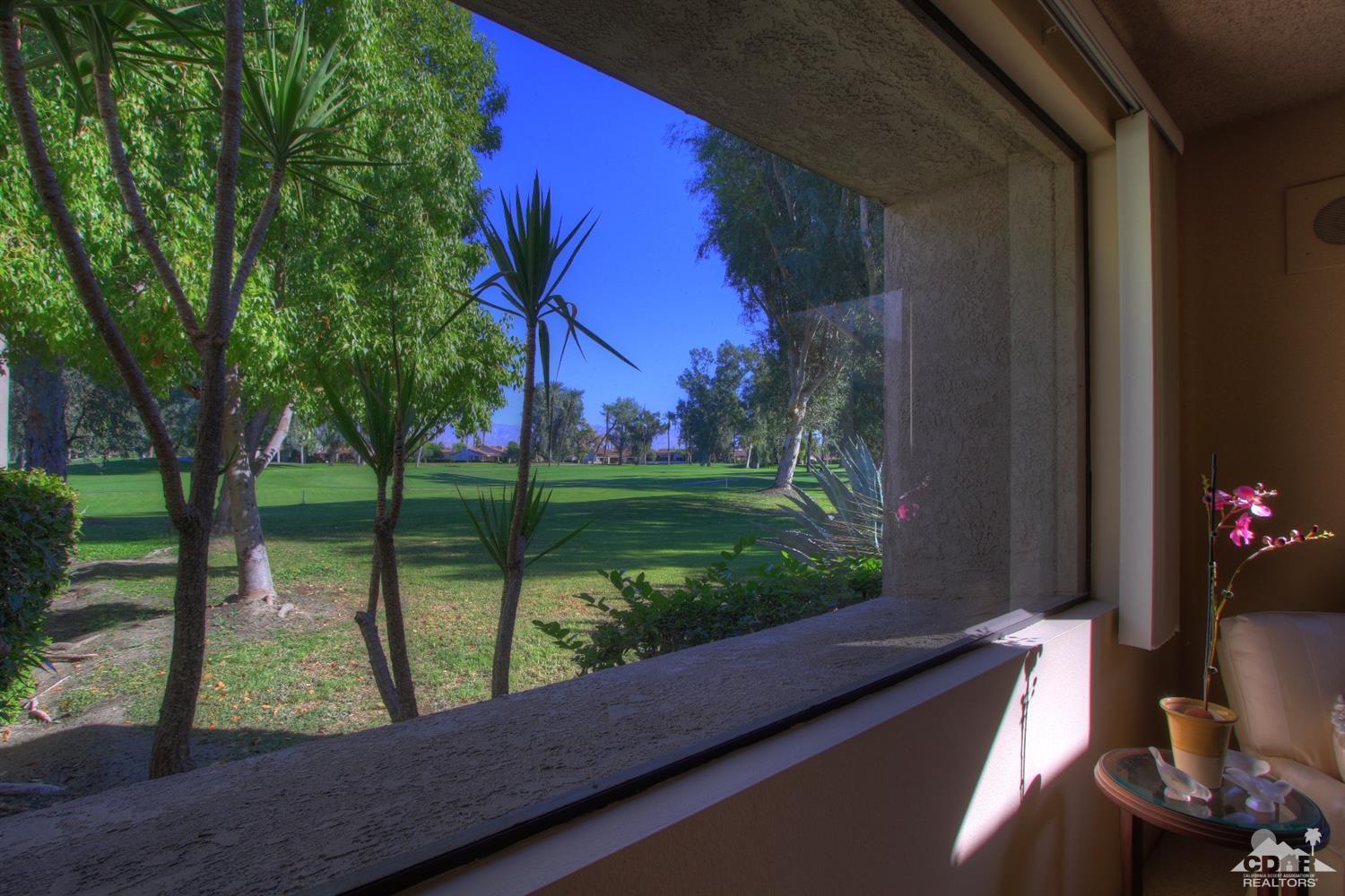 927 Inverness Drive Rancho Mirage, CA 92270 - Photo 2 of 42 a view of a yard from a balcony