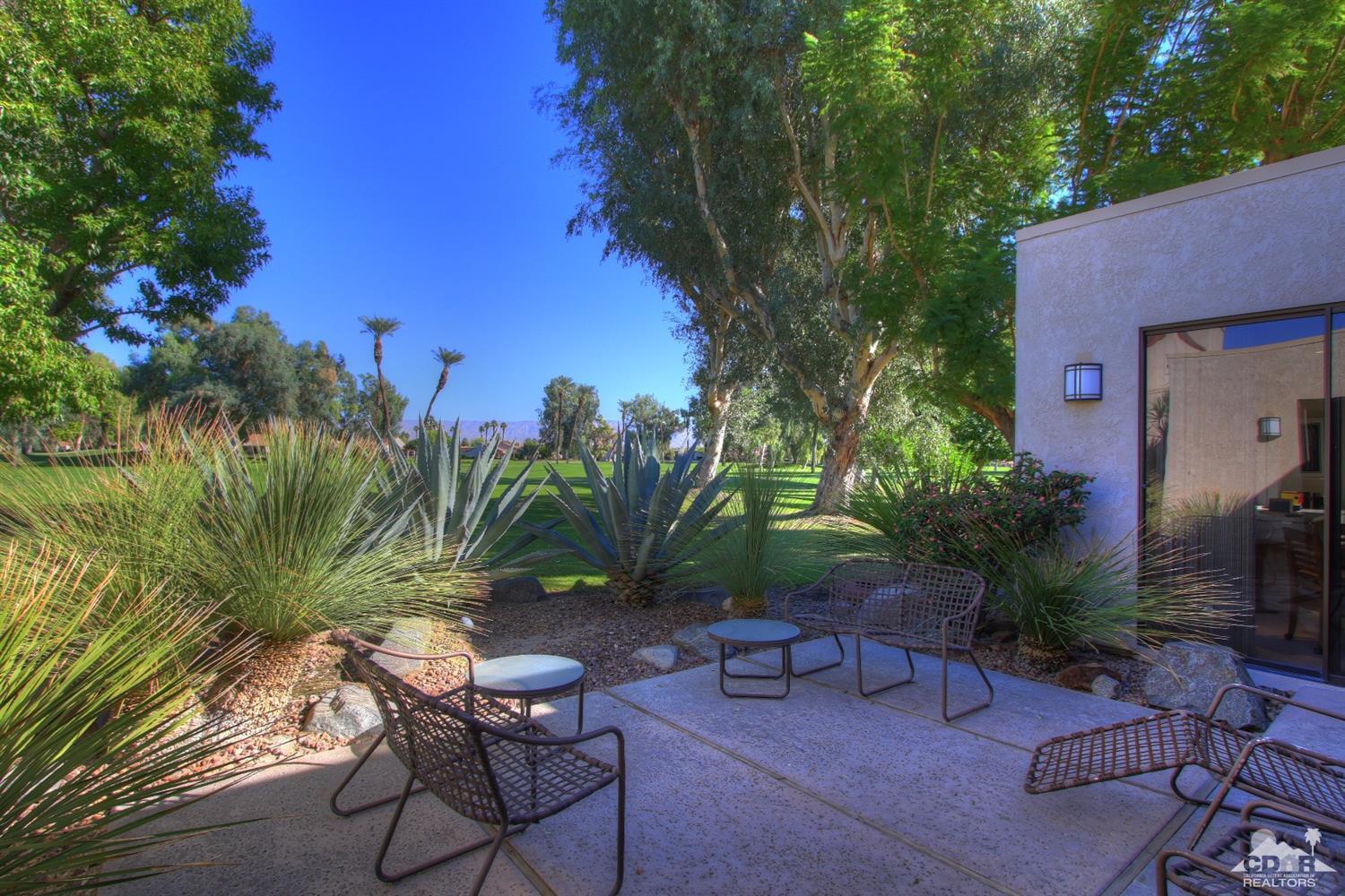 927 Inverness Drive Rancho Mirage, CA 92270 - Photo 11 of 42 a view of a backyard with sitting area
