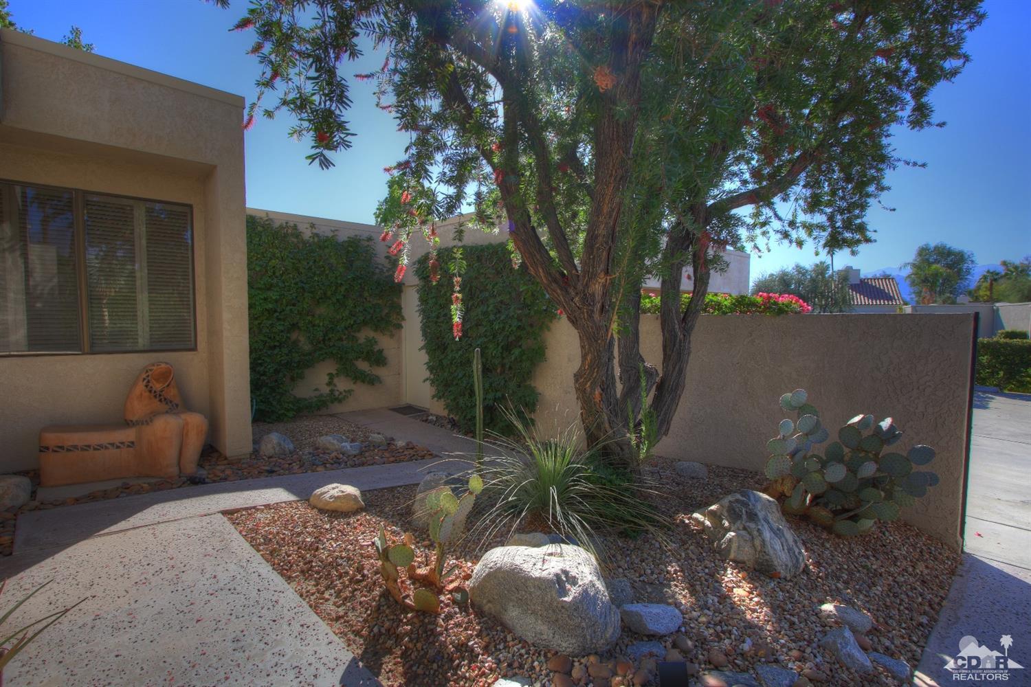 927 Inverness Drive Rancho Mirage, CA 92270 - Photo 14 of 42 a view of backyard with outdoor seating and plants