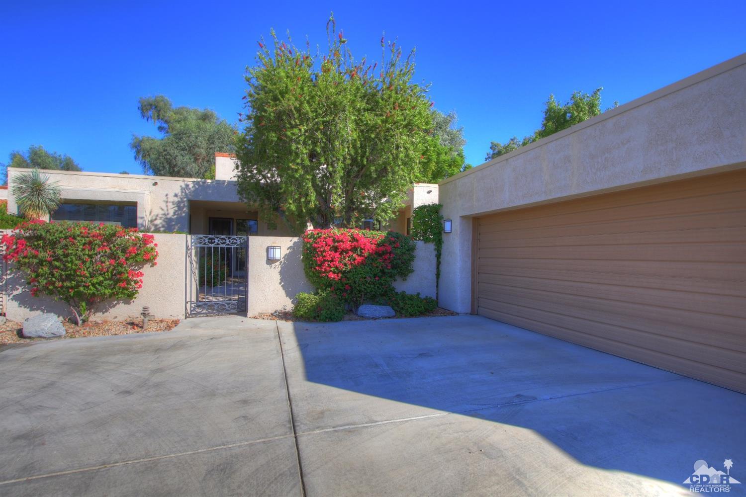 927 Inverness Drive Rancho Mirage, CA 92270 - Photo 34 of 42 a view of a backyard with potted plants
