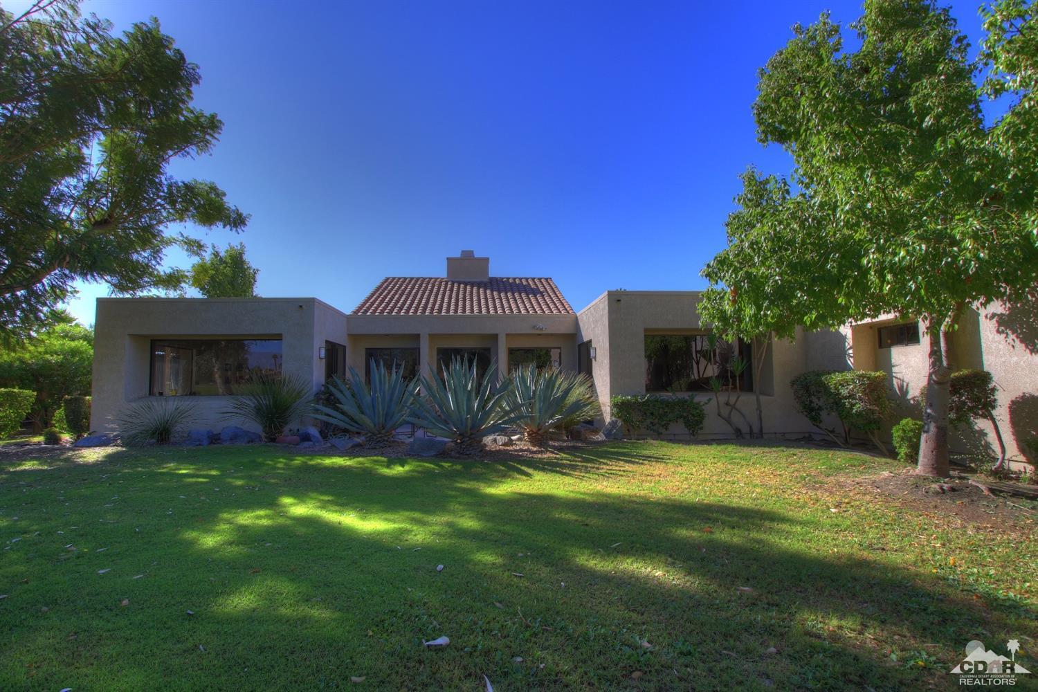 927 Inverness Drive Rancho Mirage, CA 92270 - Photo 35 of 42 a view of a house with a yard porch and sitting area
