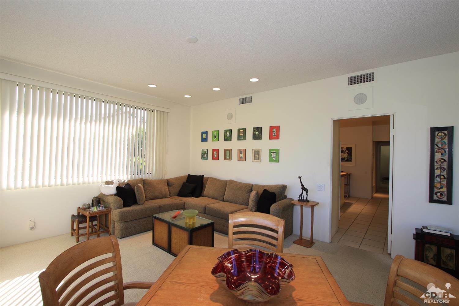 927 Inverness Drive Rancho Mirage, CA 92270 - Photo 5 of 42 a living room with furniture and a large window