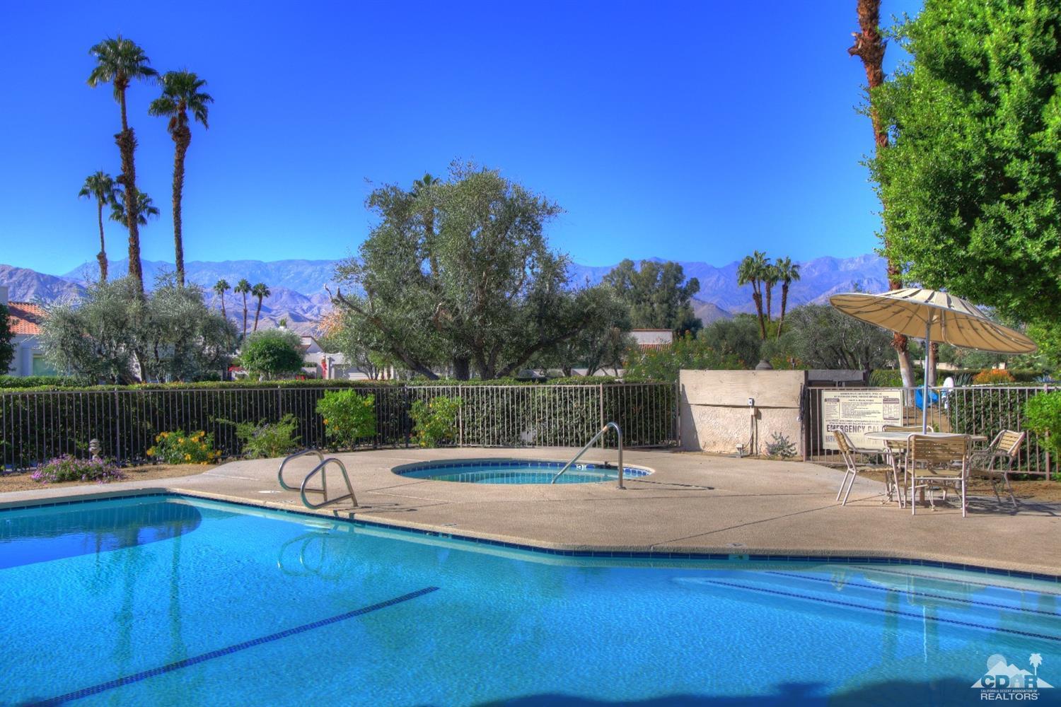 927 Inverness Drive Rancho Mirage, CA 92270 - Photo 42 of 42 a view of a swimming pool with a patio