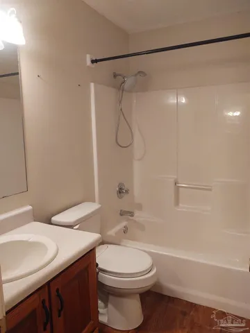 a view of a room that has a window in it