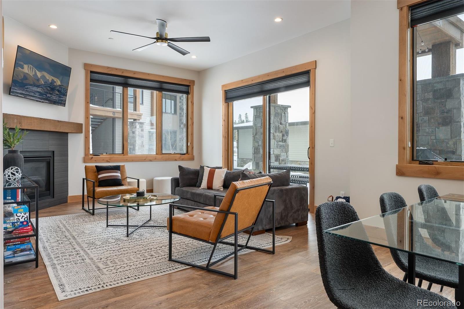72 Meadow Trail, Unit F102 Fraser, CO 80442 - Photo 12 of 35 a living room with furniture and a large window