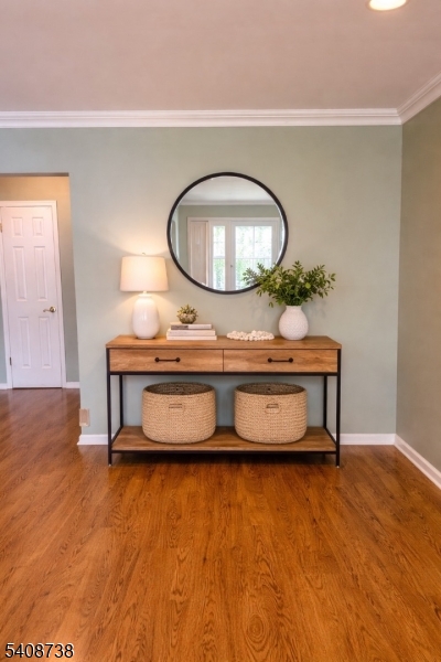 27 Espy Road, Unit A7 Caldwell, NJ 07006 - Photo 11 of 29 a living room with furniture and a wooden floor