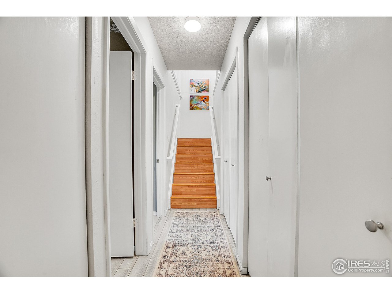 1209 Centaur Circle, Unit B Lafayette, CO 80026 - Photo 18 of 36 a view of entryway with wooden floor