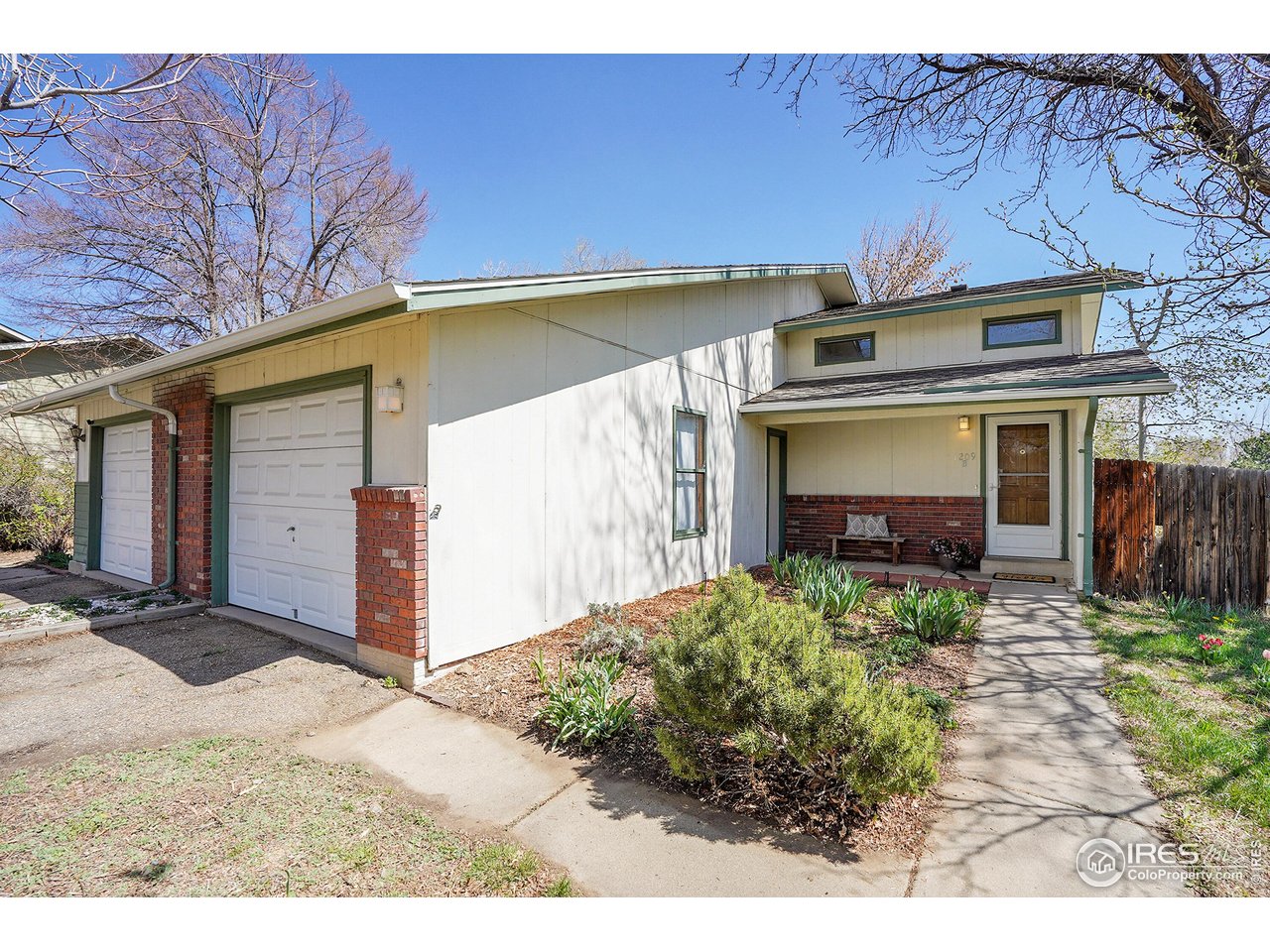 1209 Centaur Circle, Unit B Lafayette, CO 80026 - Photo 2 of 36 a view of a house with a patio