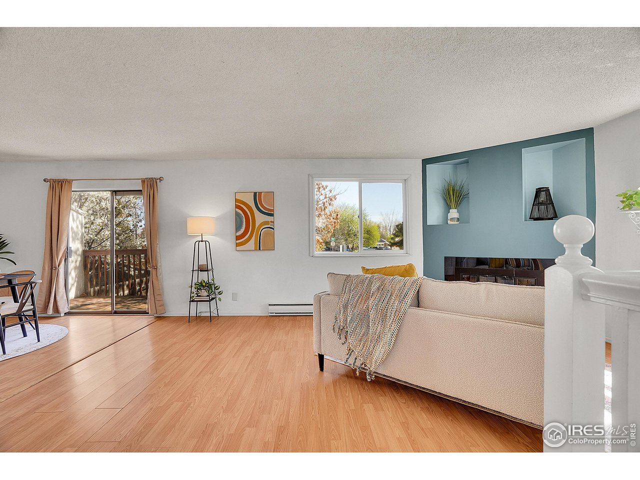 1209 Centaur Circle, Unit B Lafayette, CO 80026 - Photo 36 of 36 a living room with furniture and a table