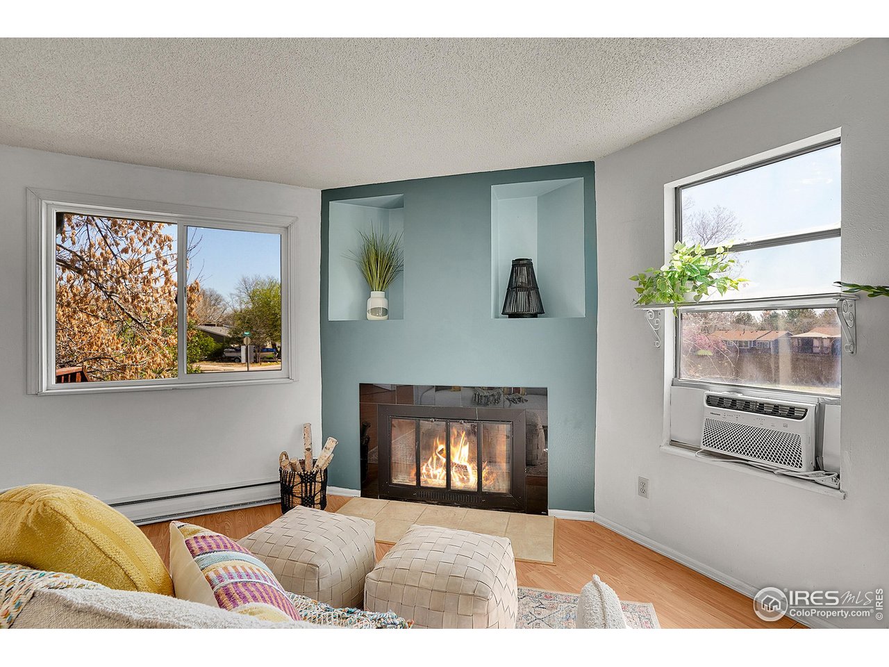 1209 Centaur Circle, Unit B Lafayette, CO 80026 - Photo 5 of 36 a living room with furniture and a fireplace