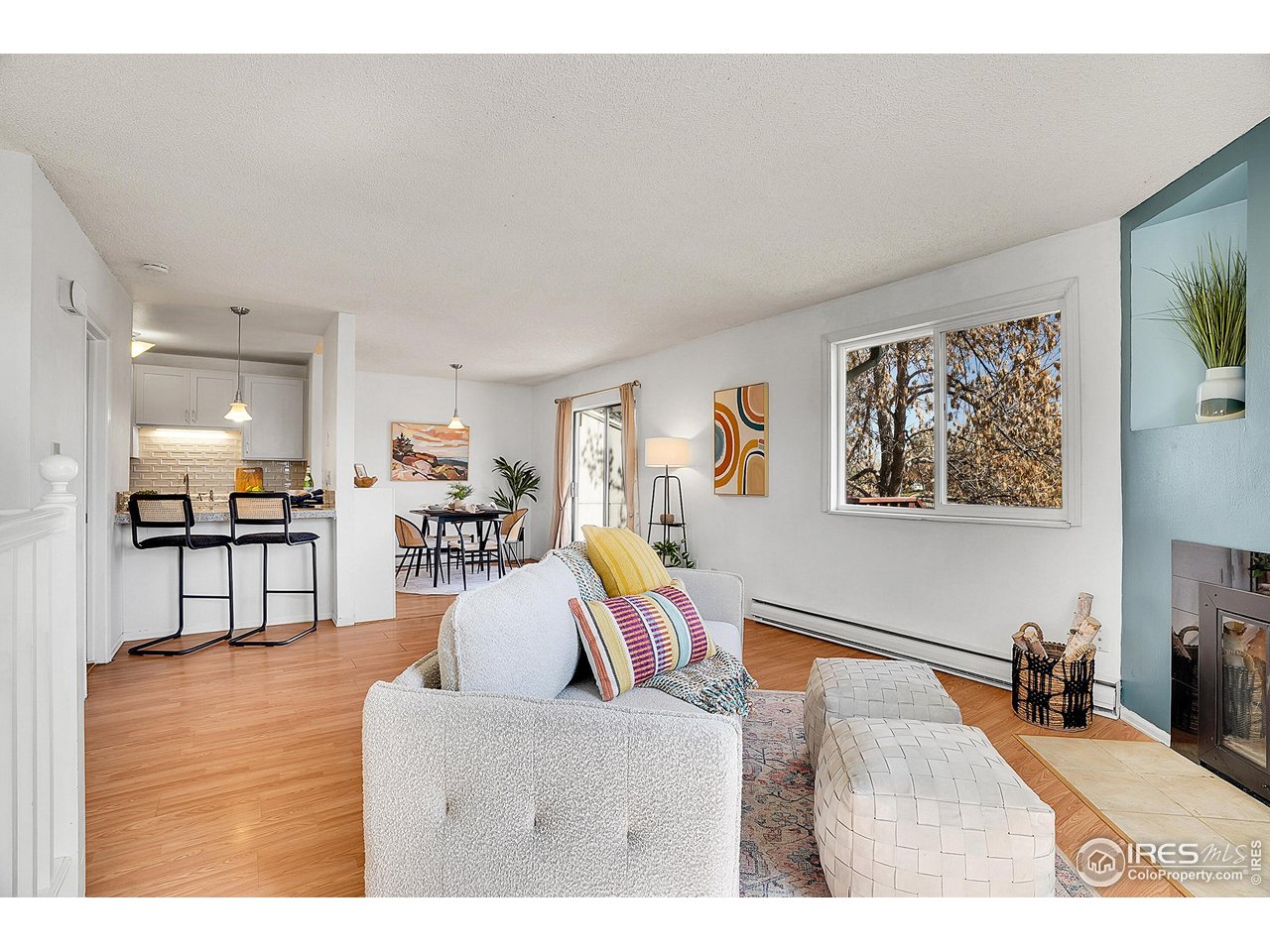 1209 Centaur Circle, Unit B Lafayette, CO 80026 - Photo 8 of 36 a living room with furniture and a flat screen tv