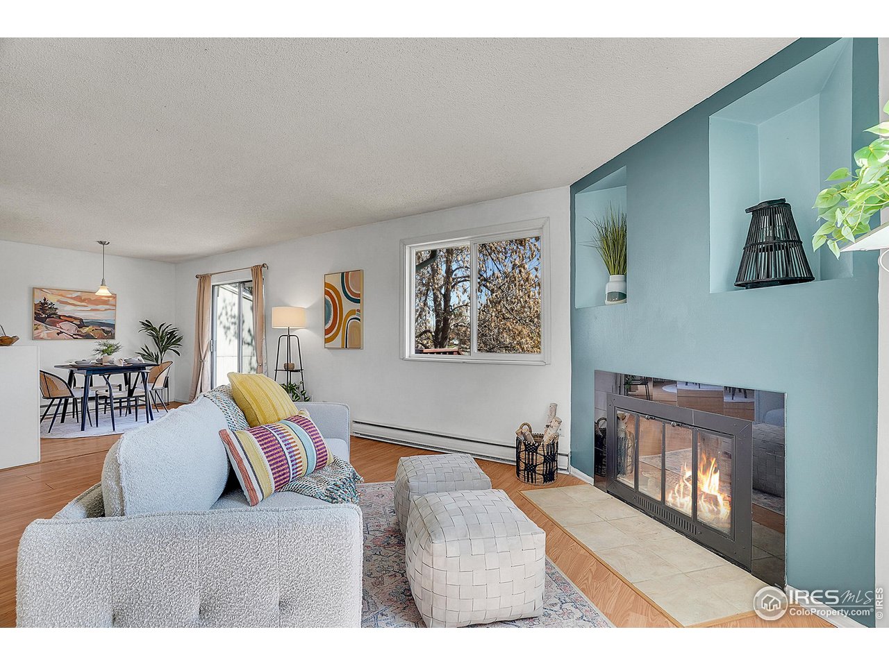 1209 Centaur Circle, Unit B Lafayette, CO 80026 - Photo 9 of 36 a living room with furniture and a wooden floor