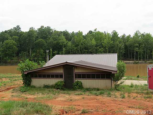2532 Killian Road Edgemoor, SC 29712 - Photo 10 of 16 a house with trees in front of it