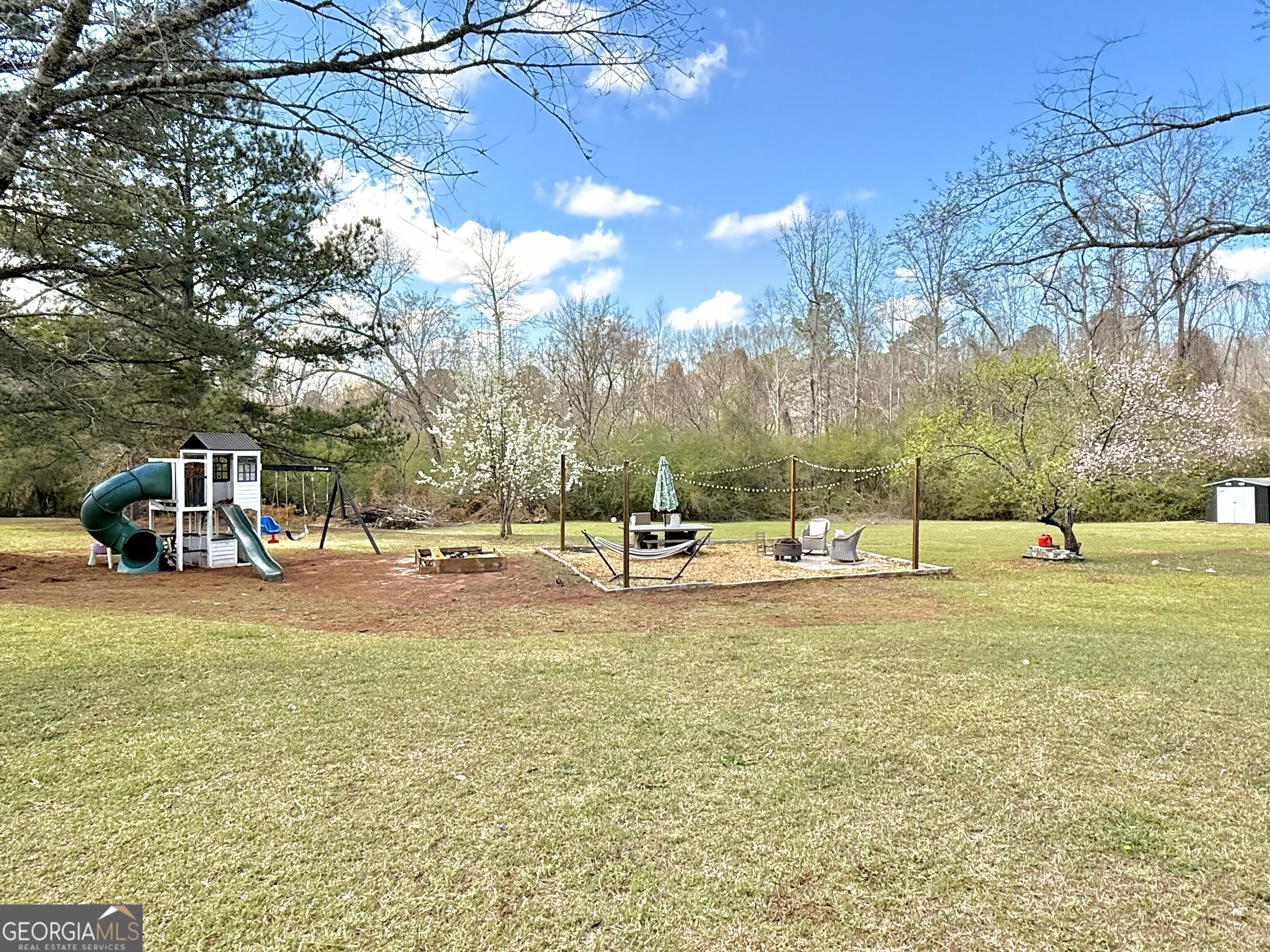 919 West Milner Road Concord, GA 30206 - Photo 15 of 40 a view of a lake with houses