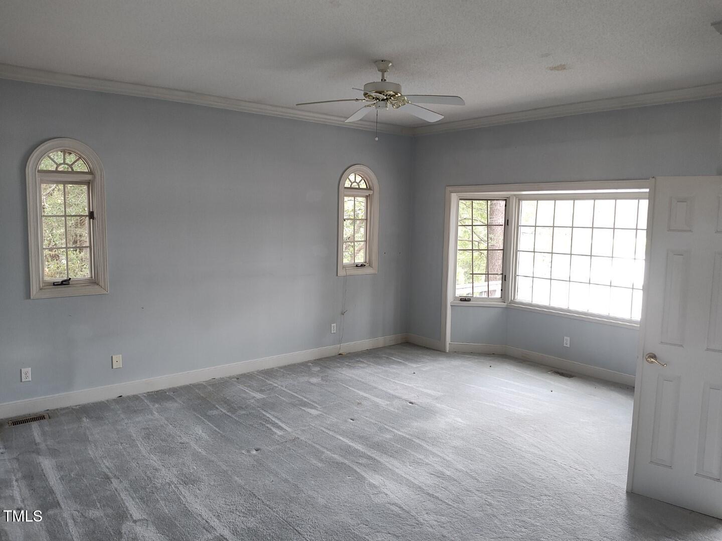 11 Abington Drive Pinehurst, NC 28374 - Photo 12 of 32 a view of an empty room with a window