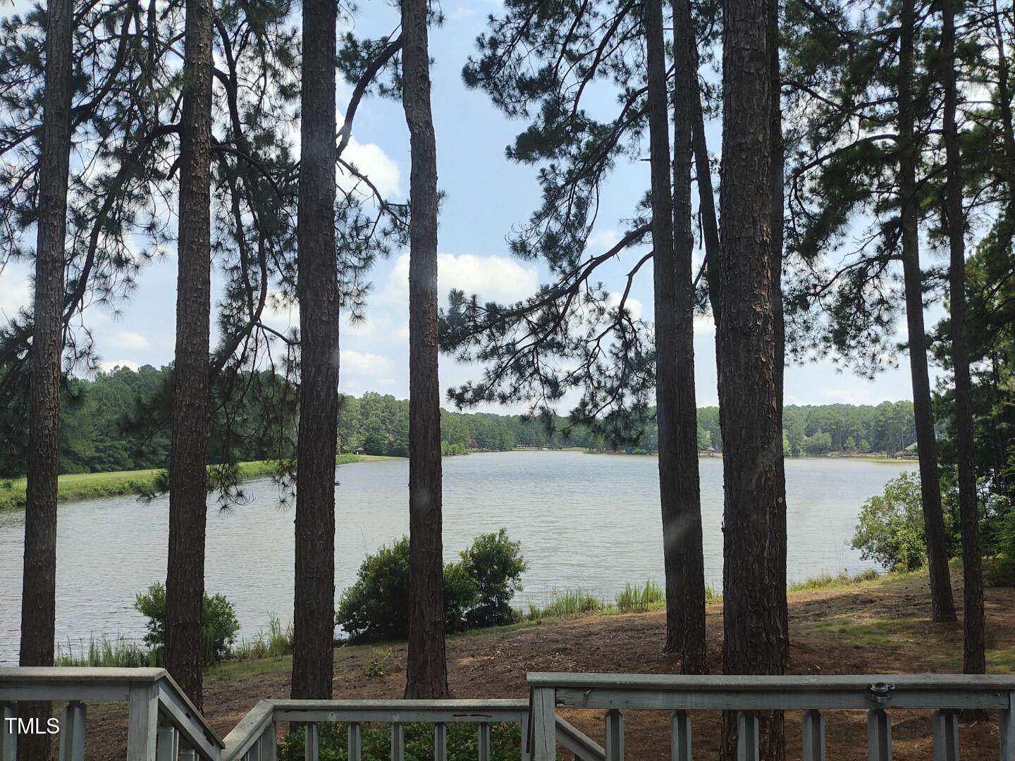 11 Abington Drive Pinehurst, NC 28374 - Photo 15 of 32 a view of lake with a tree