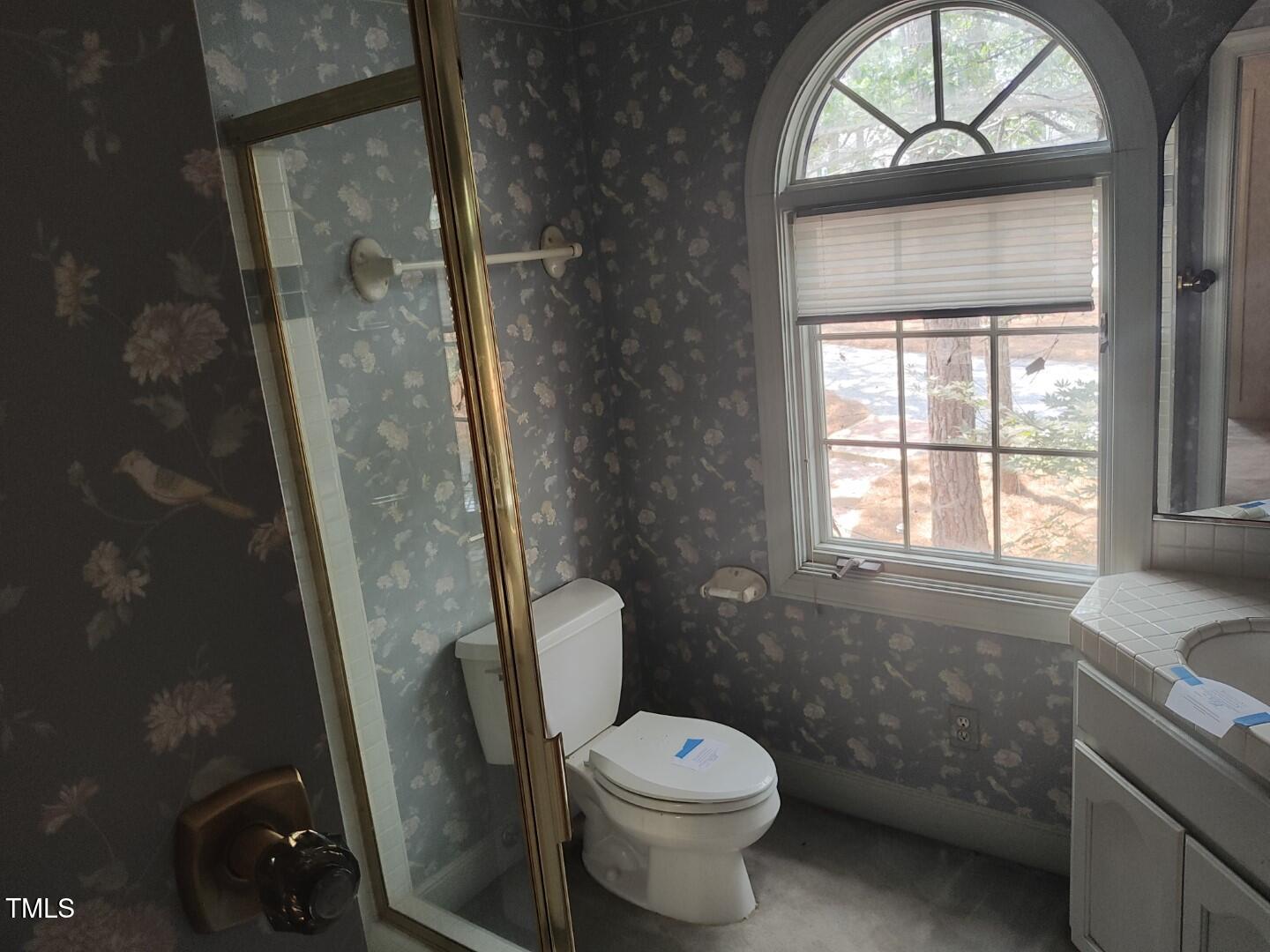 11 Abington Drive Pinehurst, NC 28374 - Photo 27 of 32 a bathroom with a toilet sink and tub