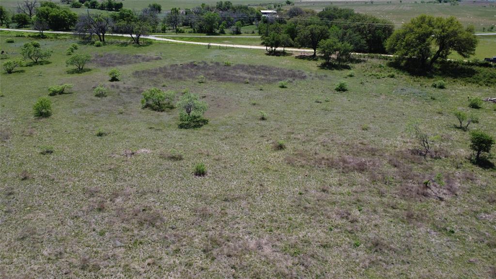 1702 St Energy Tx 76452 Gustine, TX 76455 - Photo 17 of 17 a view of a dry yard with trees