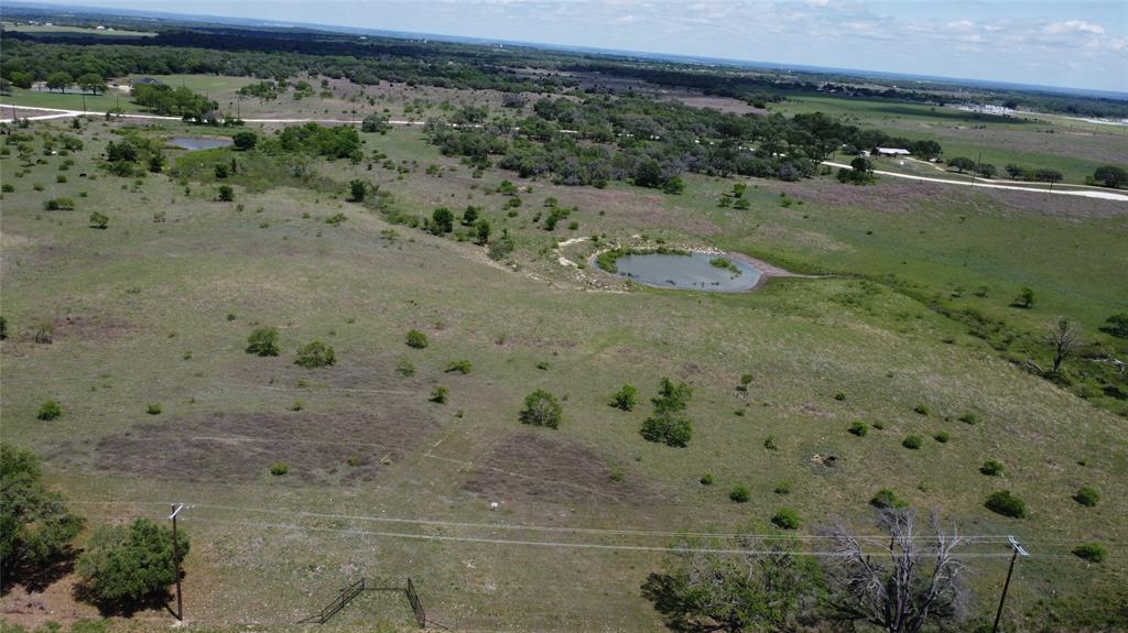 1702 St Energy Tx 76452 Gustine, TX 76455 - Photo 7 of 17 a view of a dry yard with wooden fence