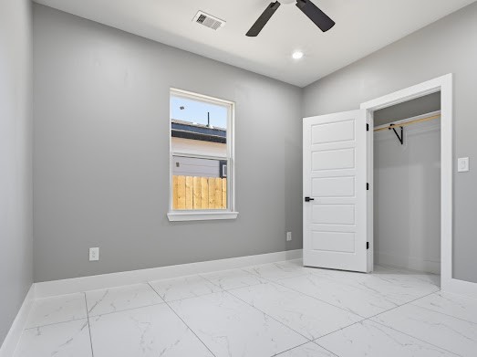 8216 Locksley Road, Unit B Houston, TX 77078 - Photo 11 of 15 an empty room with closet and chandelier fan
