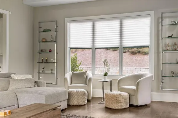 a bathroom with a shower a sink and mirror