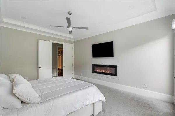 a living room with a couch and a large window