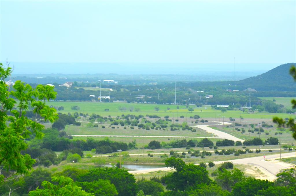 1239 Hidden Rock Road Glen Rose, TX 76043 - Photo 3 of 16 a view of a lake with a houses